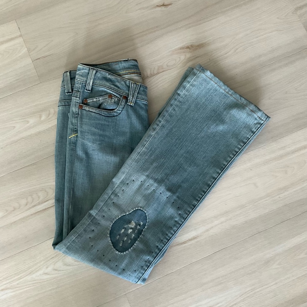 Vintage washed denim color with patches jeans